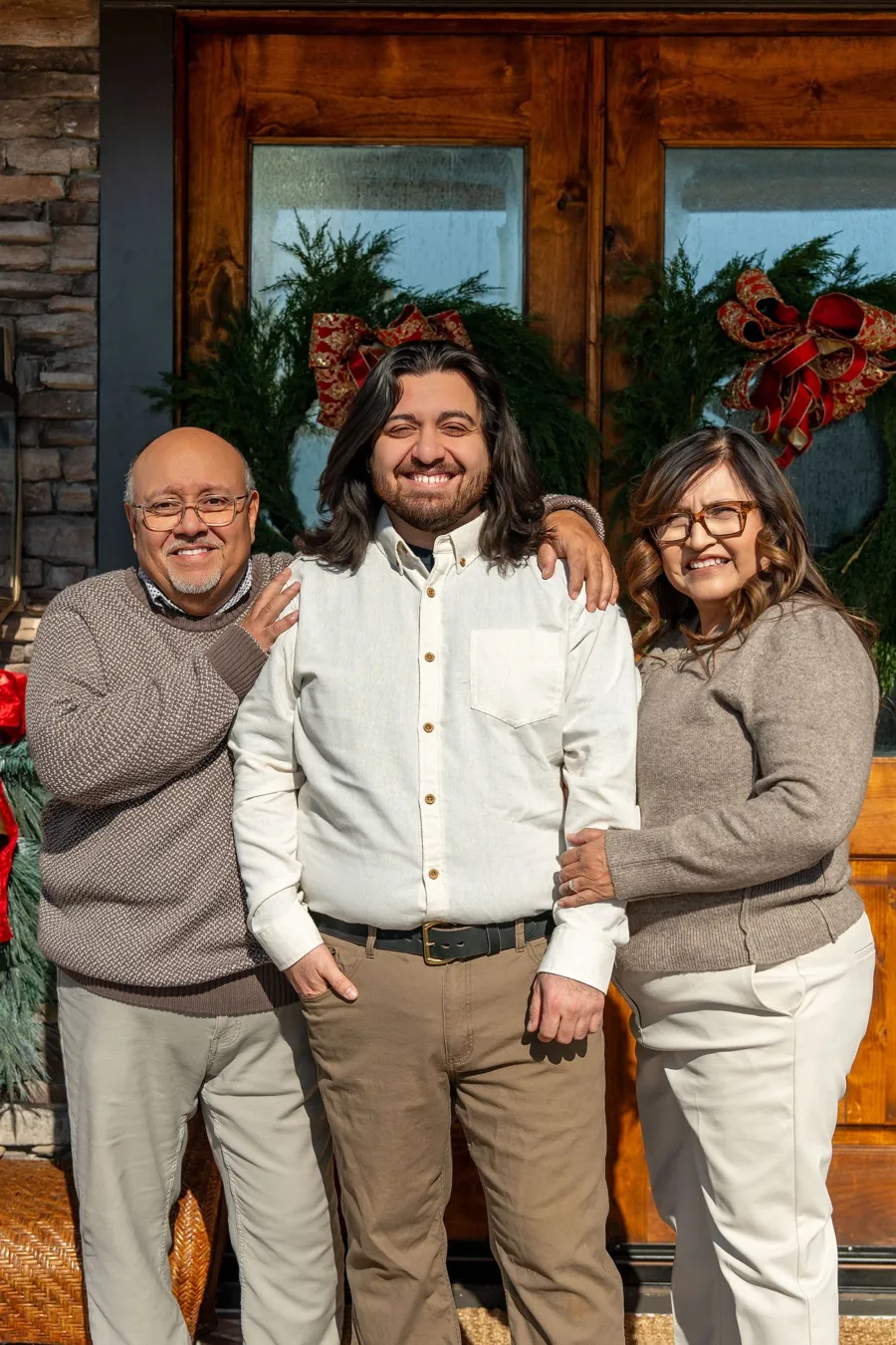 Family members together on a holiday porch