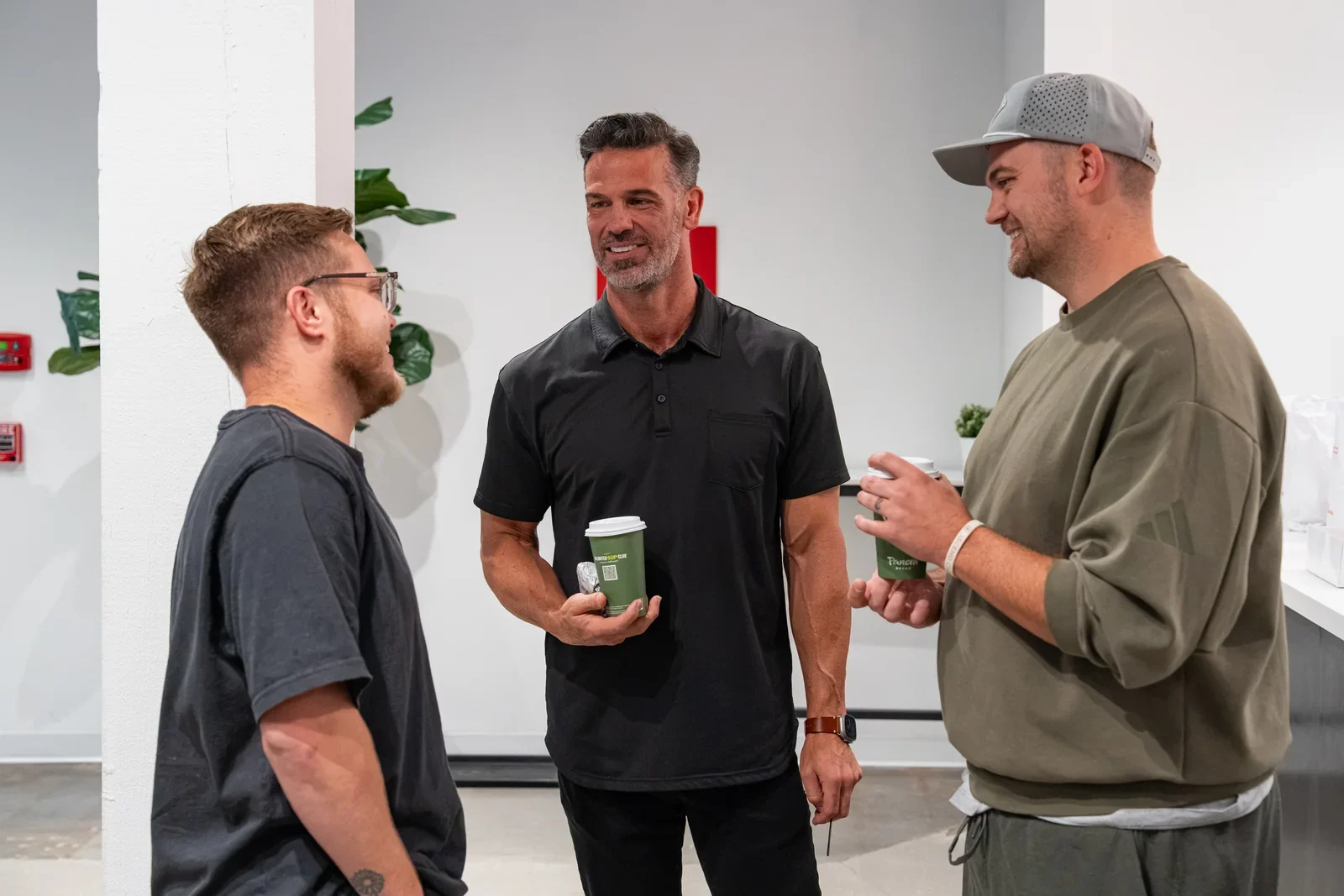 Attendees enjoying a conversation over coffee